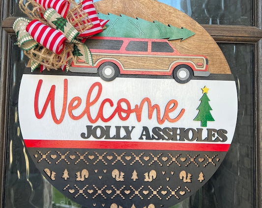 Welcome Jolly Assholes Door Hanger